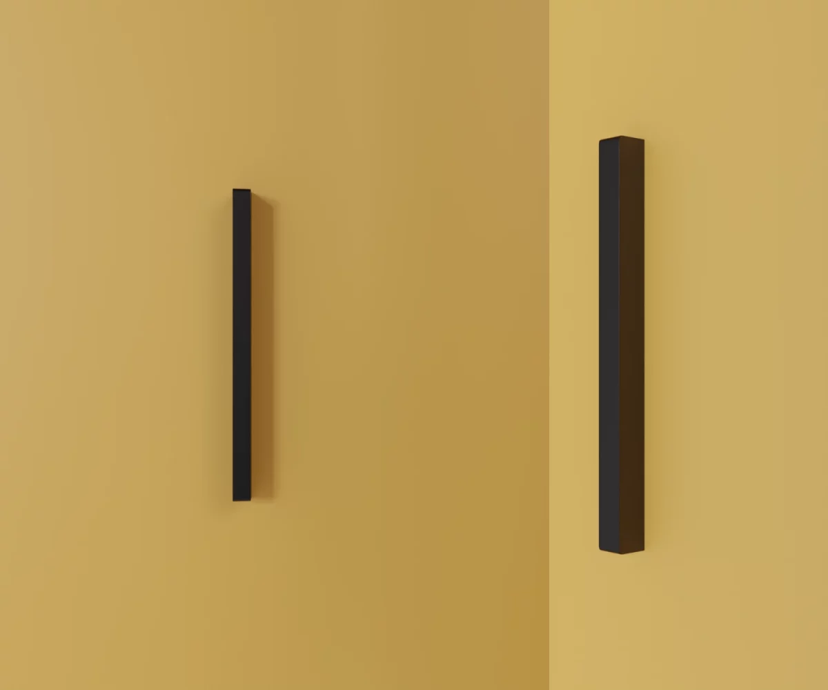 Zwei mattschwarze Zink-Möbelgriffe vom Typ HA-ZI-10066 vor gelbem Hintergrund: links in Frontalansicht, rechts in Dreiviertelansicht.