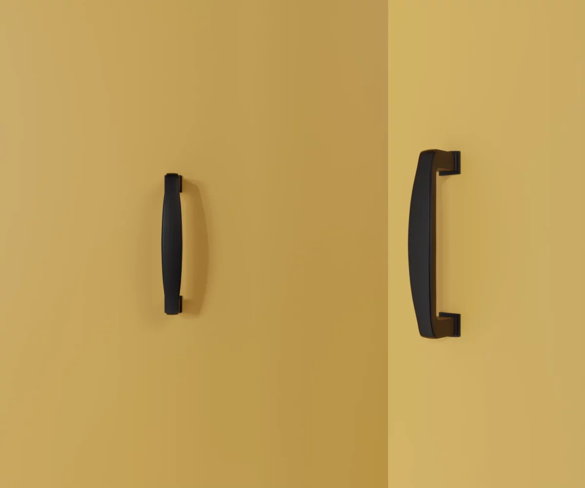 Zwei mattschwarze Zink-Möbelgriffe vom Typ HA-ZI-11014 vor gelbem Hintergrund: links in Frontalansicht, rechts in Dreiviertelansicht.
