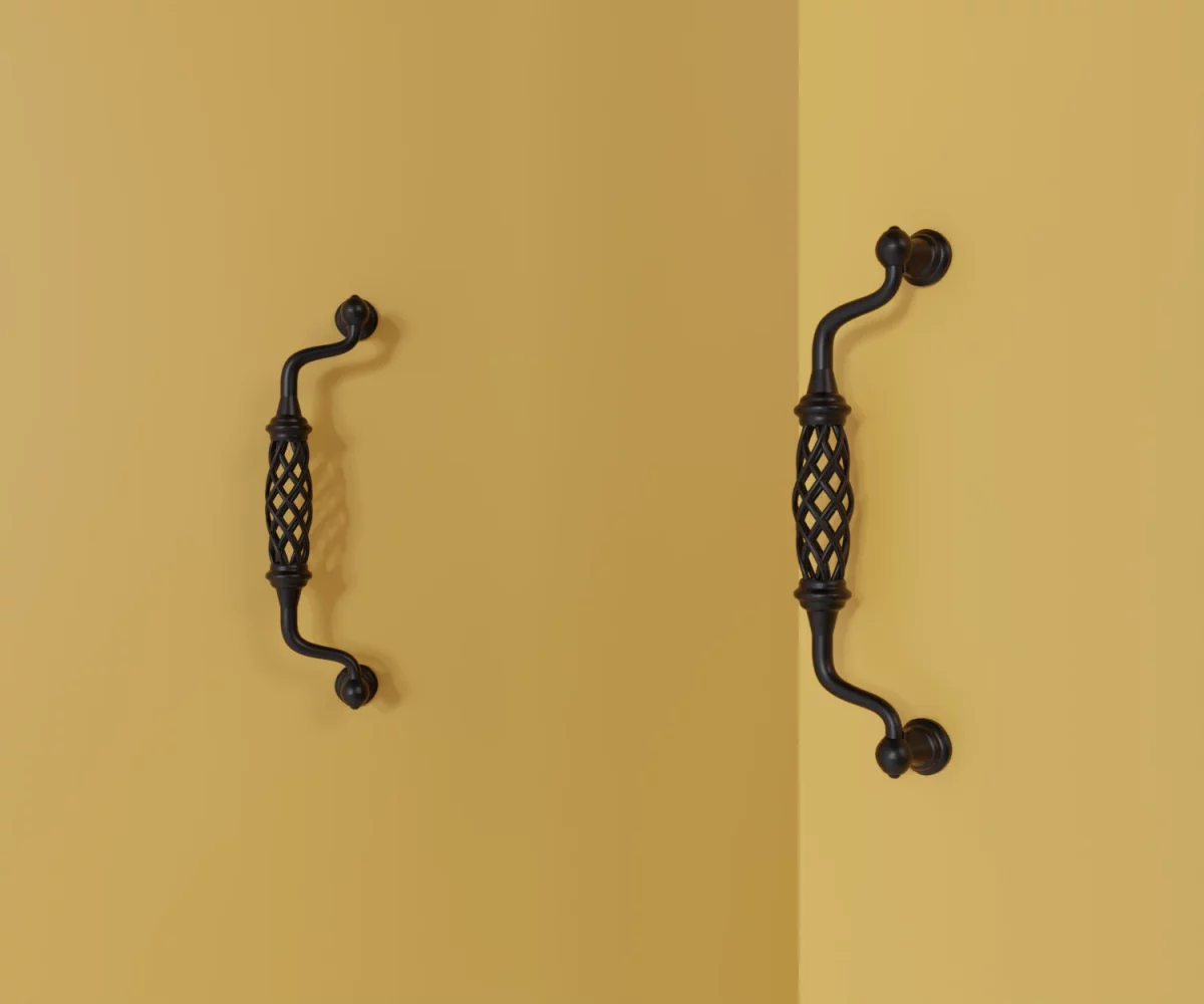 Zwei mattschwarze Zink-Möbelgriffe vom Typ HA-ZI-11032 vor gelbem Hintergrund: links in Frontalansicht, rechts in Dreiviertelansicht.