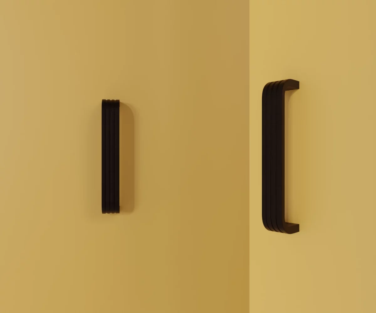 Zwei mattschwarze Zink-Möbelgriffe vom Typ HA-ZI-11145 vor gelbem Hintergrund: links in Frontalansicht, rechts in Dreiviertelansicht.
