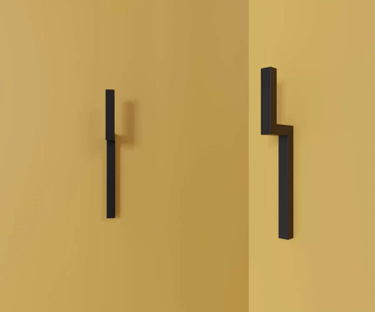 Zwei mattschwarze Zink-Möbelgriffe vom Typ HA-ZI-12012 vor gelbem Hintergrund: links in Frontalansicht, rechts in Dreiviertelansicht.