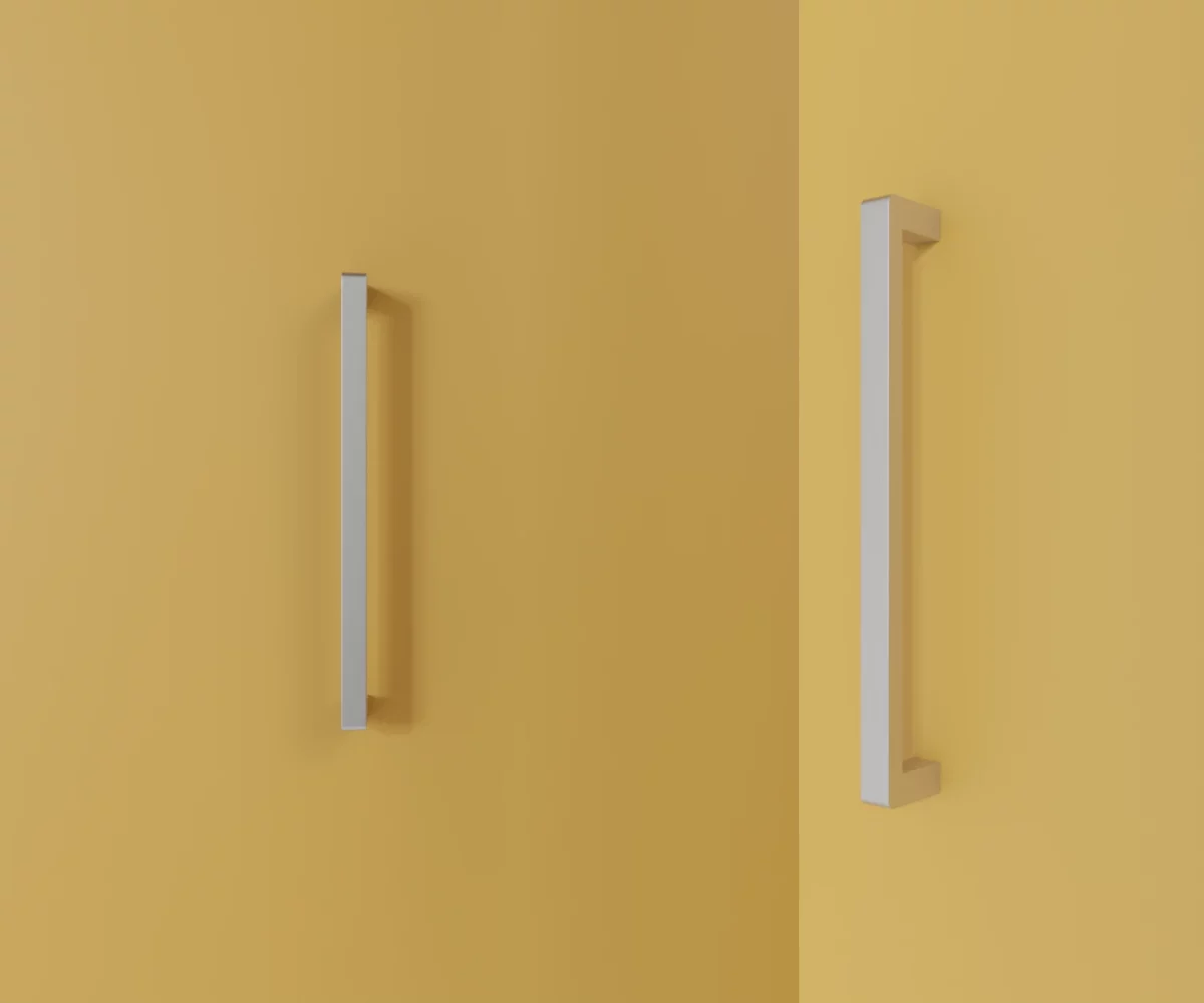Silberfarbener Aluminium-Möbelgriff HA-AD-10004 mit streng rechteckigem Design und kantiger Silhouette. Der Griff besteht aus einem geraden, flachen Bügel mit gleichmäßiger Breite und rechtwinkligen Abschlüssen. Die Kanten sind präzise gearbeitet und die Vorderseite zeigt keinerlei Wölbung oder Rundung. Der Griff ist auf der linken Seite des Bildes in Frontalansicht und auf der rechten Seite des Bildes in Seitenansicht vor pastellgelbem Hintergrund dargestellt, der farblich an einen Vanilleton erinnert.