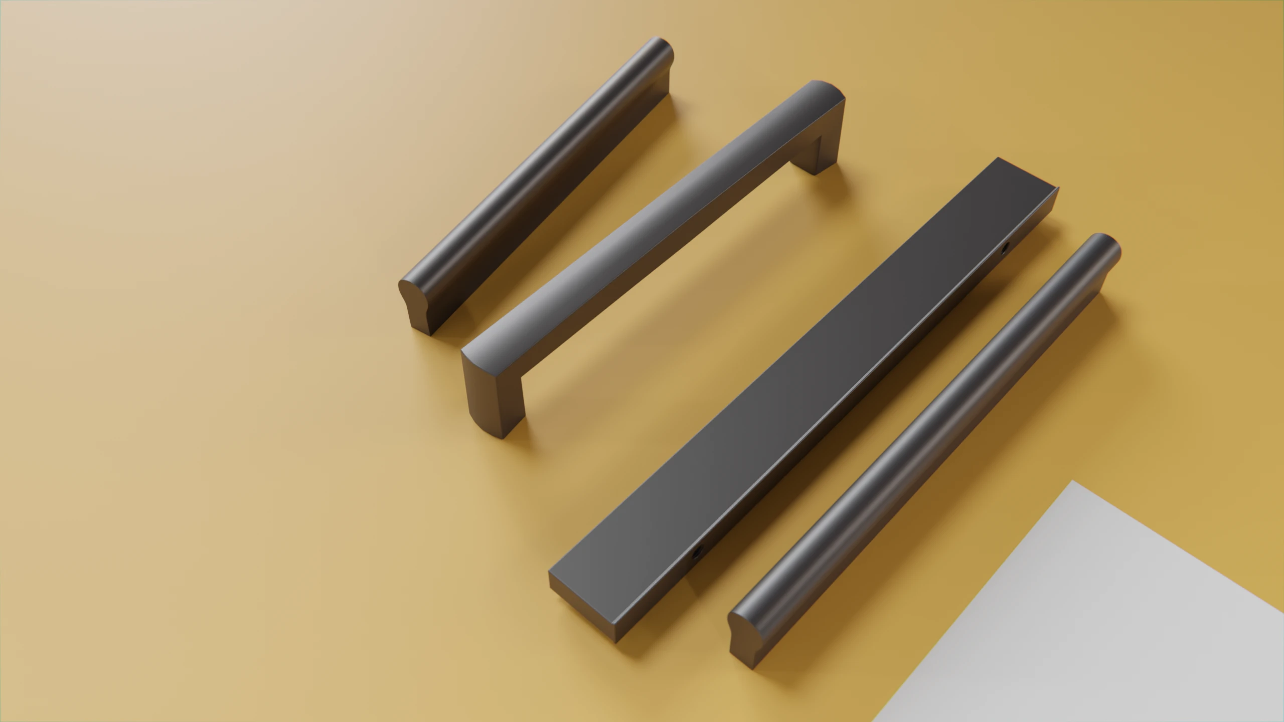 Eine Ansammlung von 4 Möbelgriffen aus Kunststoff auf gelben Hintergrund.