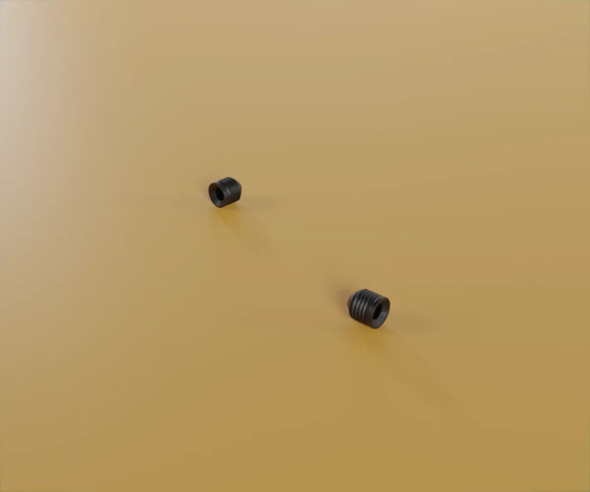 Zwei edge-Zubehörteile vom Typ FC-SE-15091 auf einem gelben Hintergrund. Hierbei handelt es sich um Inbusschrauben für das edge-System.