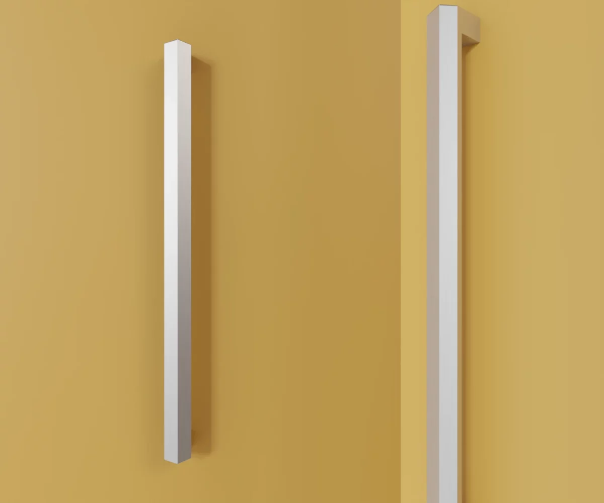 Zwei silberne Aluminium-Möbelgriffe vom Typ HA-AD-12021 vor gelbem Hintergrund: links in Frontalansicht, rechts in Dreiviertelansicht.